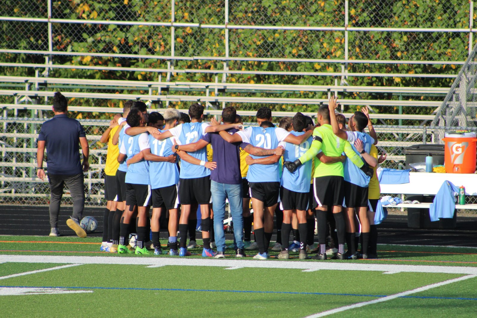BUSA team huddle